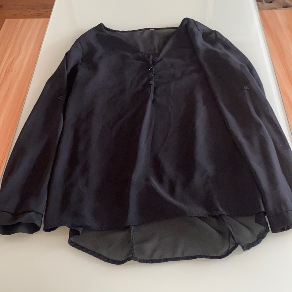 Sexy black blouse. See through in the back! Can be professional or sexy!